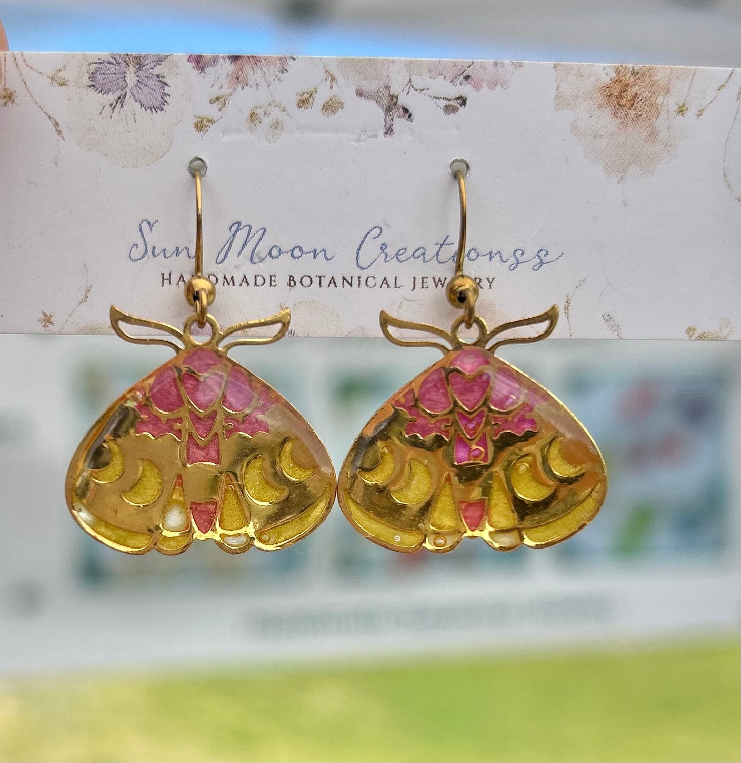 Gold moth dangles with pink and yellow accents
