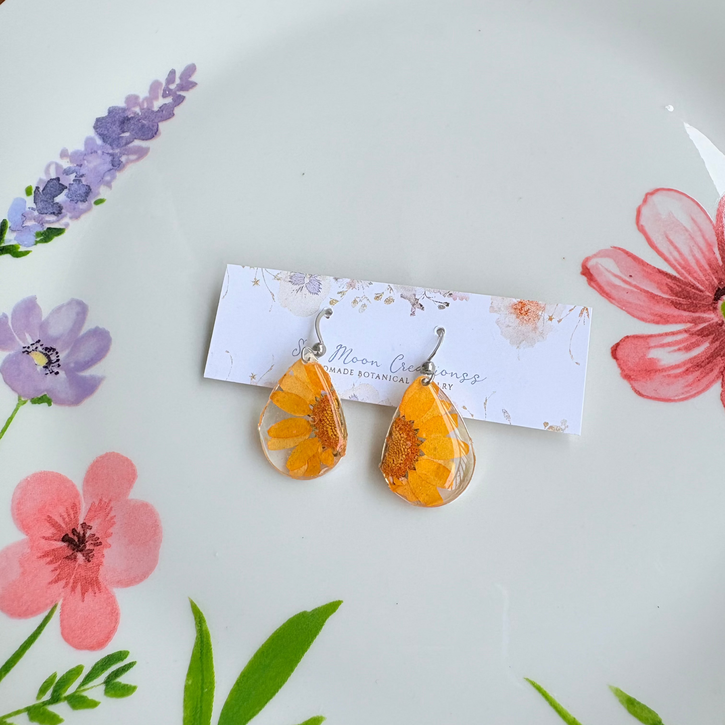 Orange Daisy Dangles in Silver